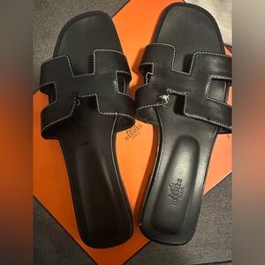 Hermes Black Oran sandal Size 47
(Leather needs repair)
